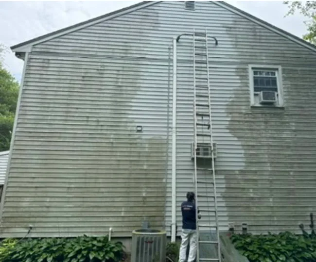 Siding soft wash in progress in Newington, CT